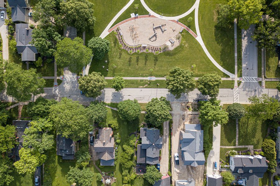 Tallmadge, OH - Aerial View of Hudson, Ohio Suburban Homes and Playground near Tallmadge, Ohio on a Sunny Day